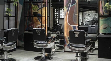 Barber chairs and art at Social Animals Barbershop & Tattoo Parlour (Seseh), Bali, Bali, ID.