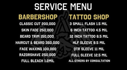 Service menu at Social Animals Barbershop & Tattoo Parlour (Canggu) in Bali, ID, highlighting barbershop and tattoo prices.