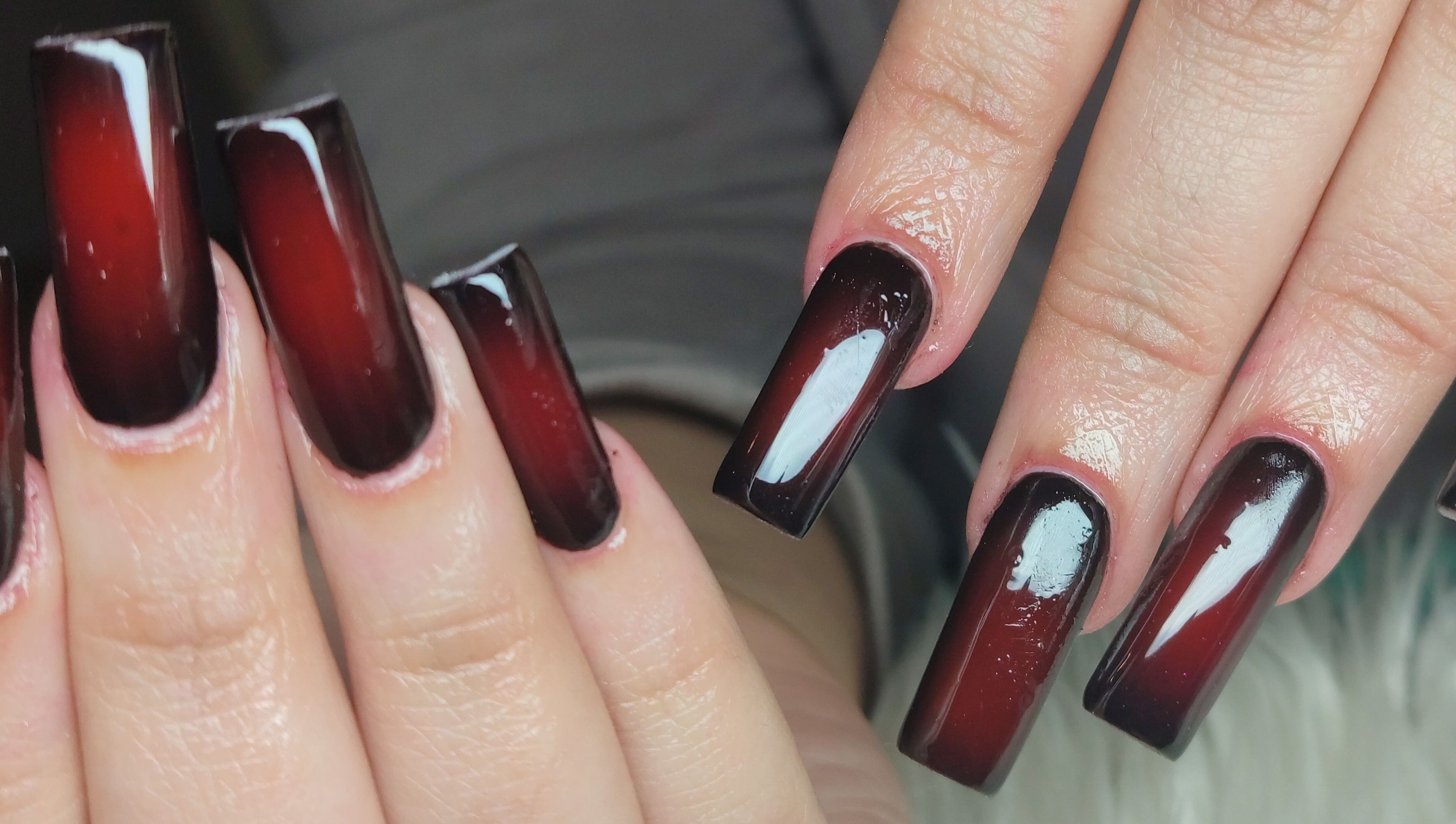 Elegant red ombre nail design at Tiamkupinails Woodstock in Cape Town, Western Cape, ZA.