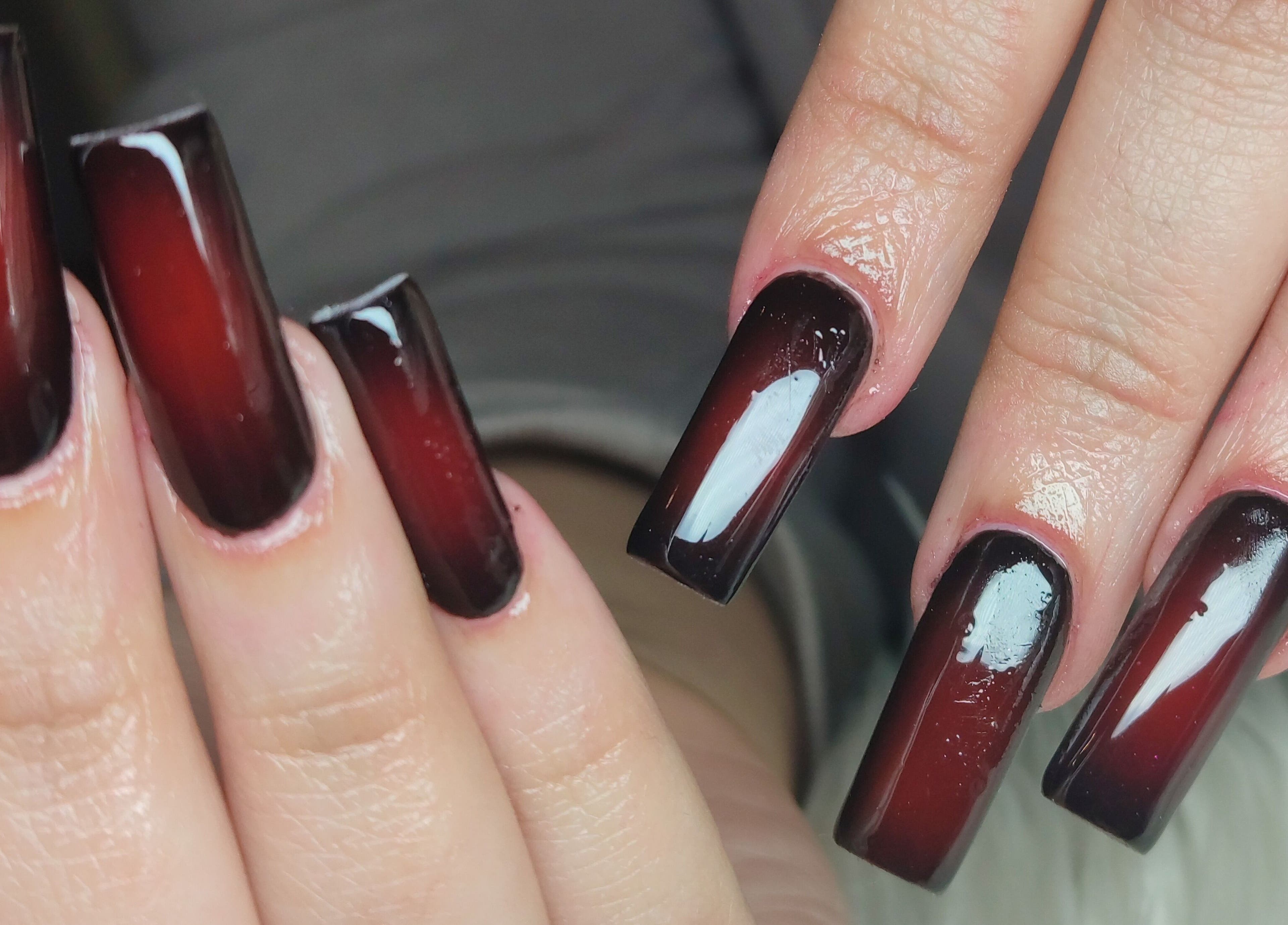 Elegant red ombre nail design at Tiamkupinails Woodstock in Cape Town, Western Cape, ZA.