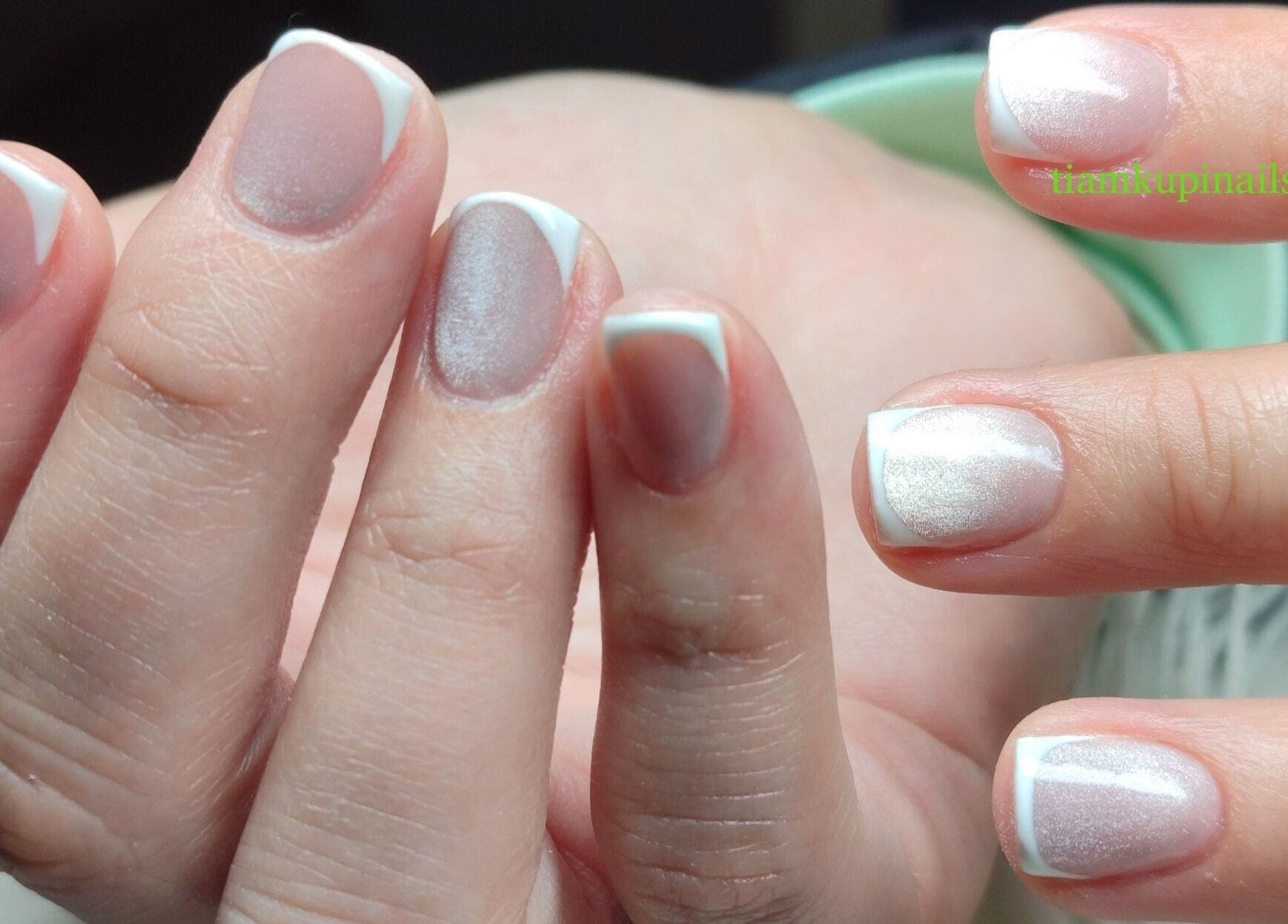 Elegant French manicure at Tiamkupinails Woodstock, Cape Town, Western Cape, ZA, showcasing glossy white tips.