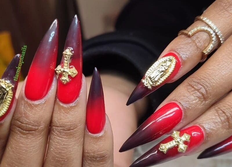 Intricate red and black ombre nails with gold accents at Tiamkupinails Woodstock, Cape Town, Western Cape, ZA.