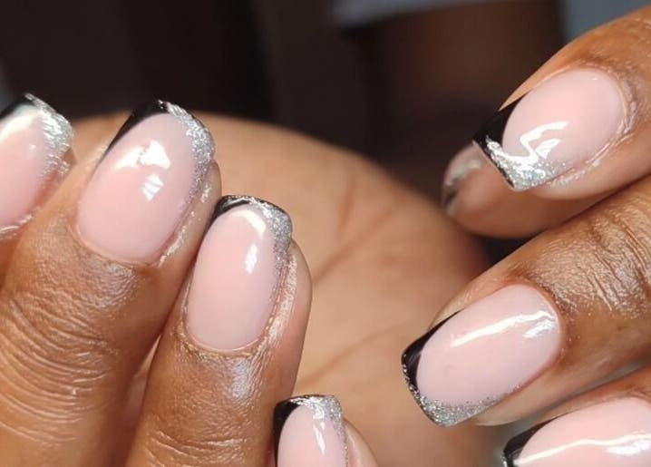 Stylish nails with silver and black French tips at Tiamkupinails Woodstock, Cape Town, Western Cape, ZA.