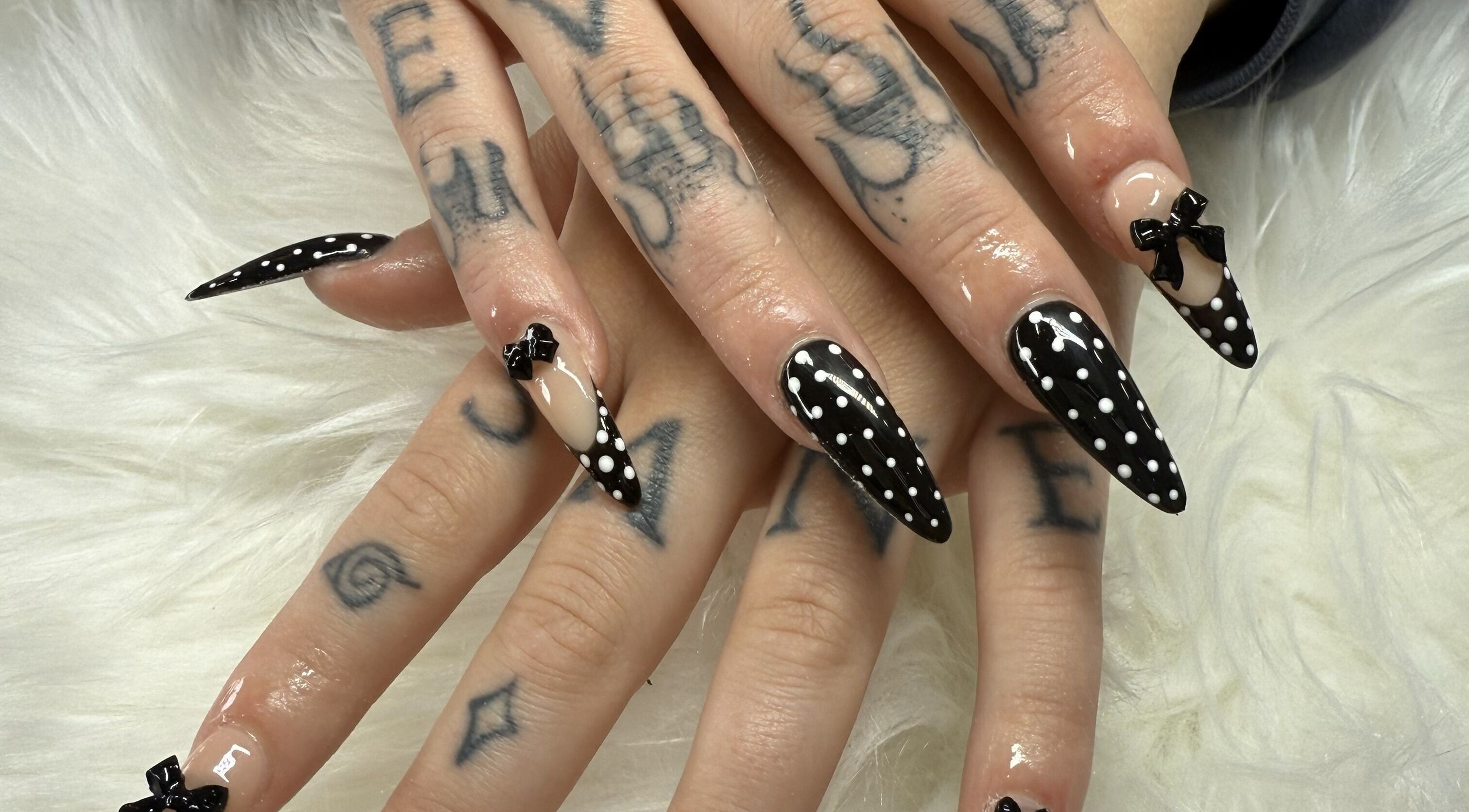 Stylish black polka dot nail art by Lee Nails & Beauty, Melbourne, Victoria, AU.