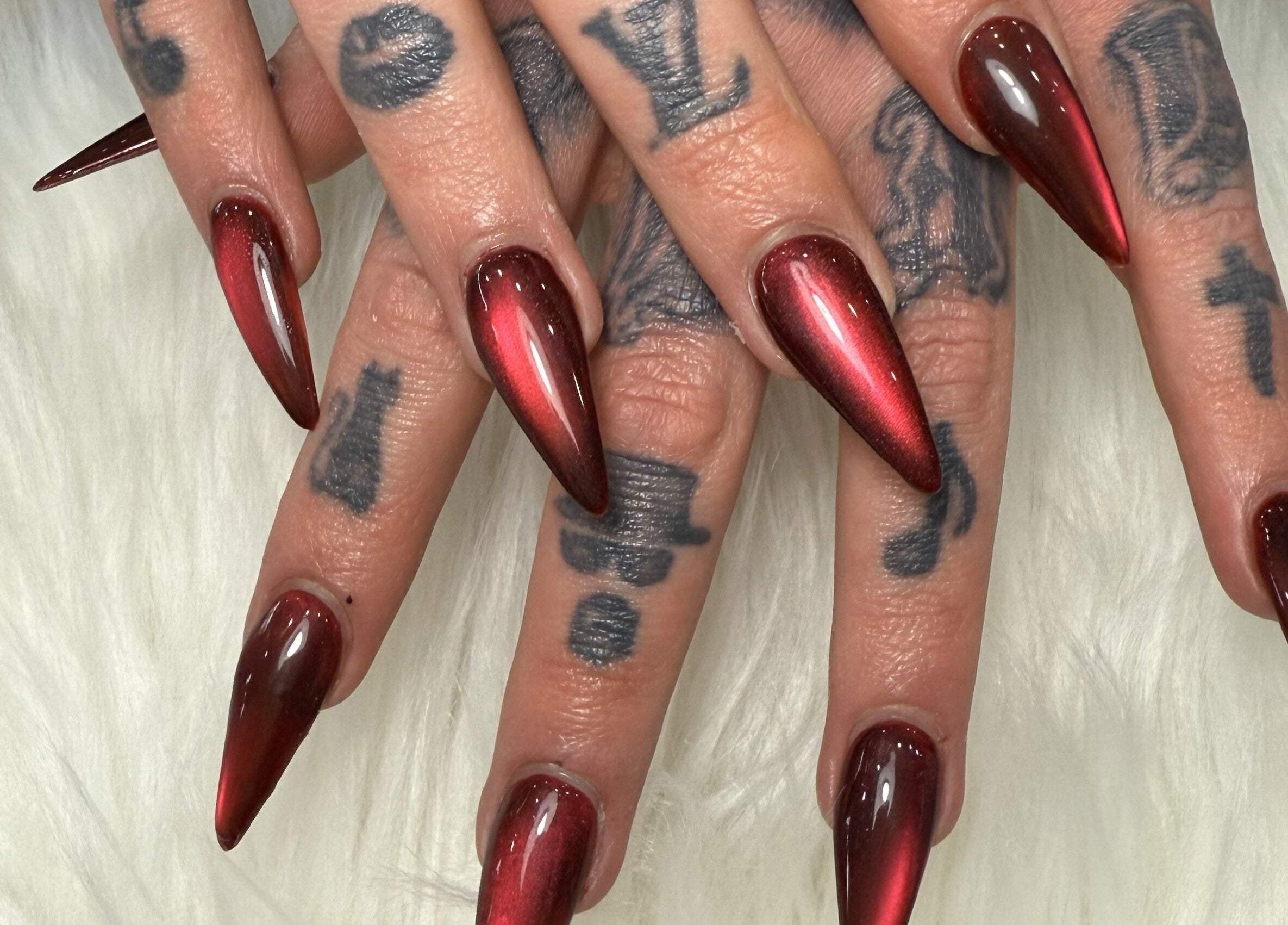Elegant red stiletto nails at Lee Nails & Beauty, Melbourne, Victoria, AU.