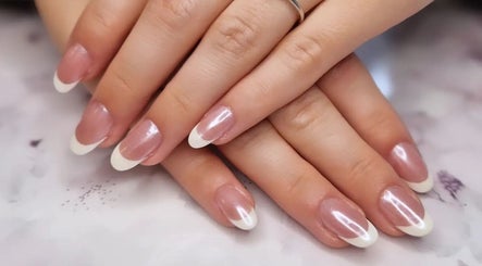 Elegant French manicure at Jennie's Gels & Beauty, Pencoed, Wales. Perfectly polished nails for a touch of class.