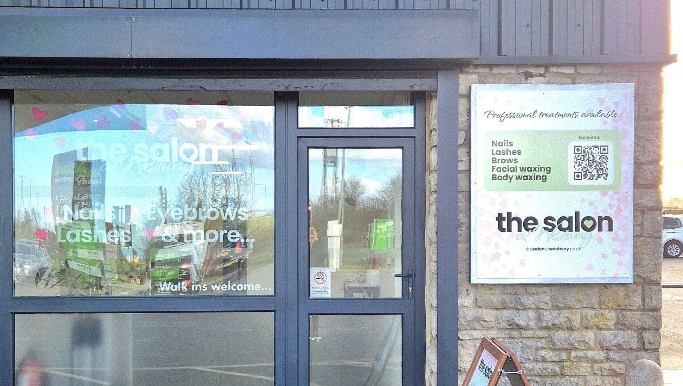 Entrance of The Salon at Westway in Marksbury, England displaying services like nails and lashes.