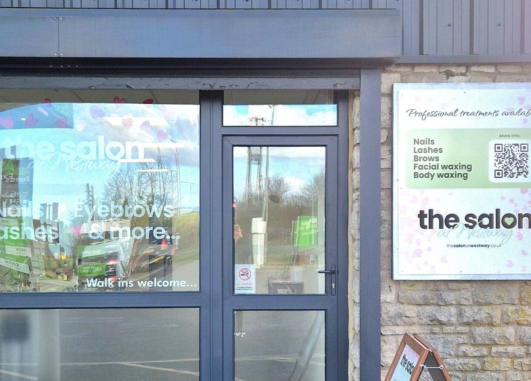 Entrance of The Salon at Westway in Marksbury, England displaying services like nails and lashes.