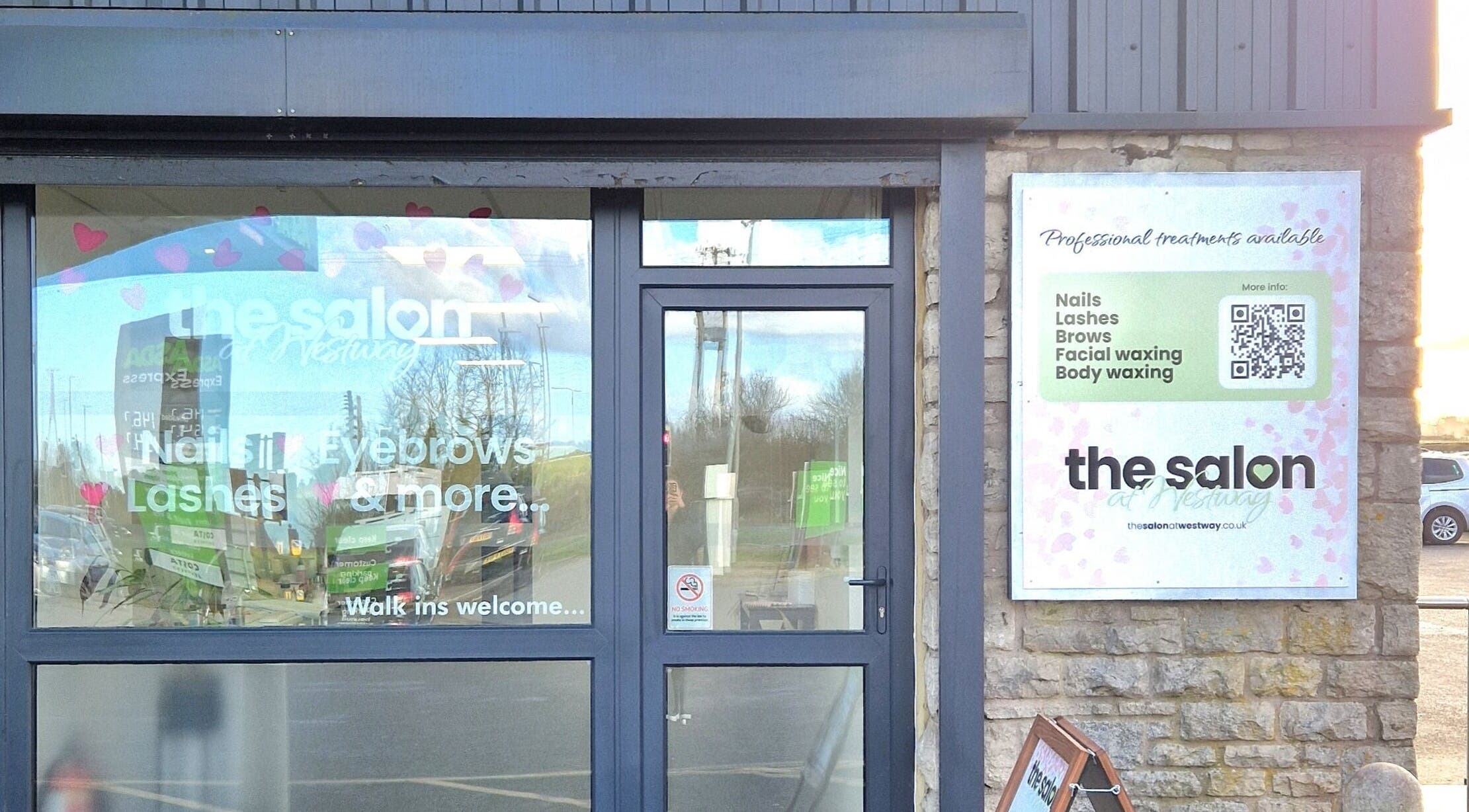 Entrance of The Salon at Westway in Marksbury, England displaying services like nails and lashes.