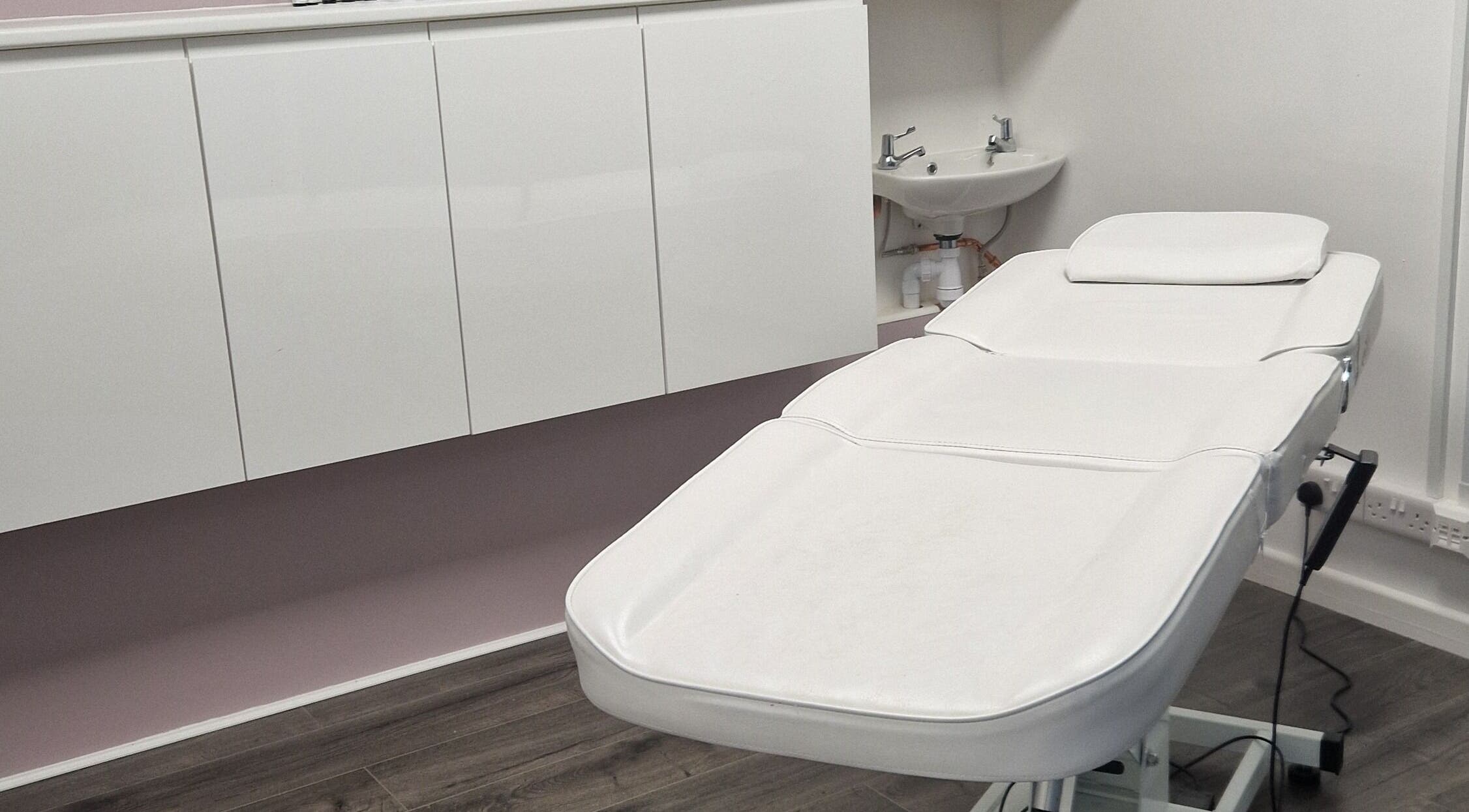 Treatment room at The Salon at Westway, Marksbury, England, GB featuring a comfortable treatment table.