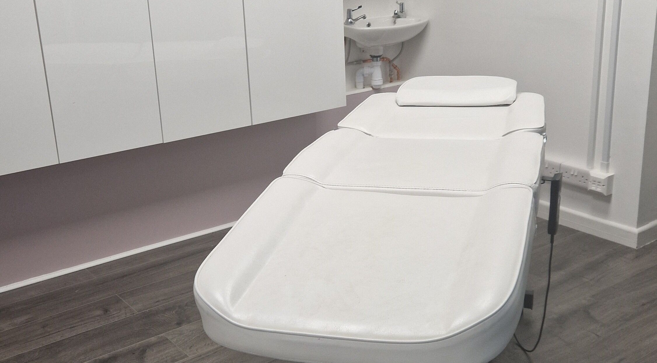 A luxurious spa bed at The Salon at Westway, Marksbury, England, GB enhances relaxation experiences.