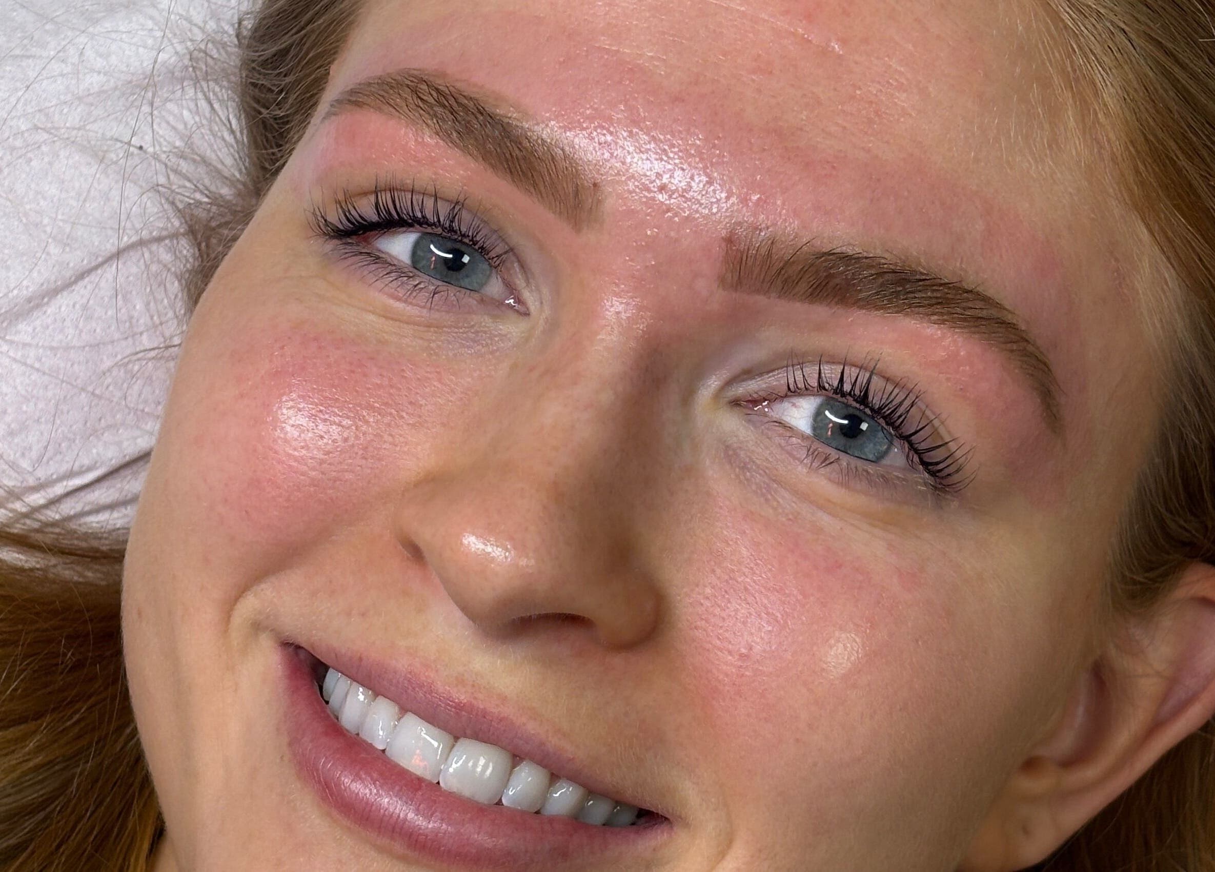 Smiling woman with fresh makeup at Face by Caitlyn in Ginger by Zoe, Cardiff, Wales, GB.