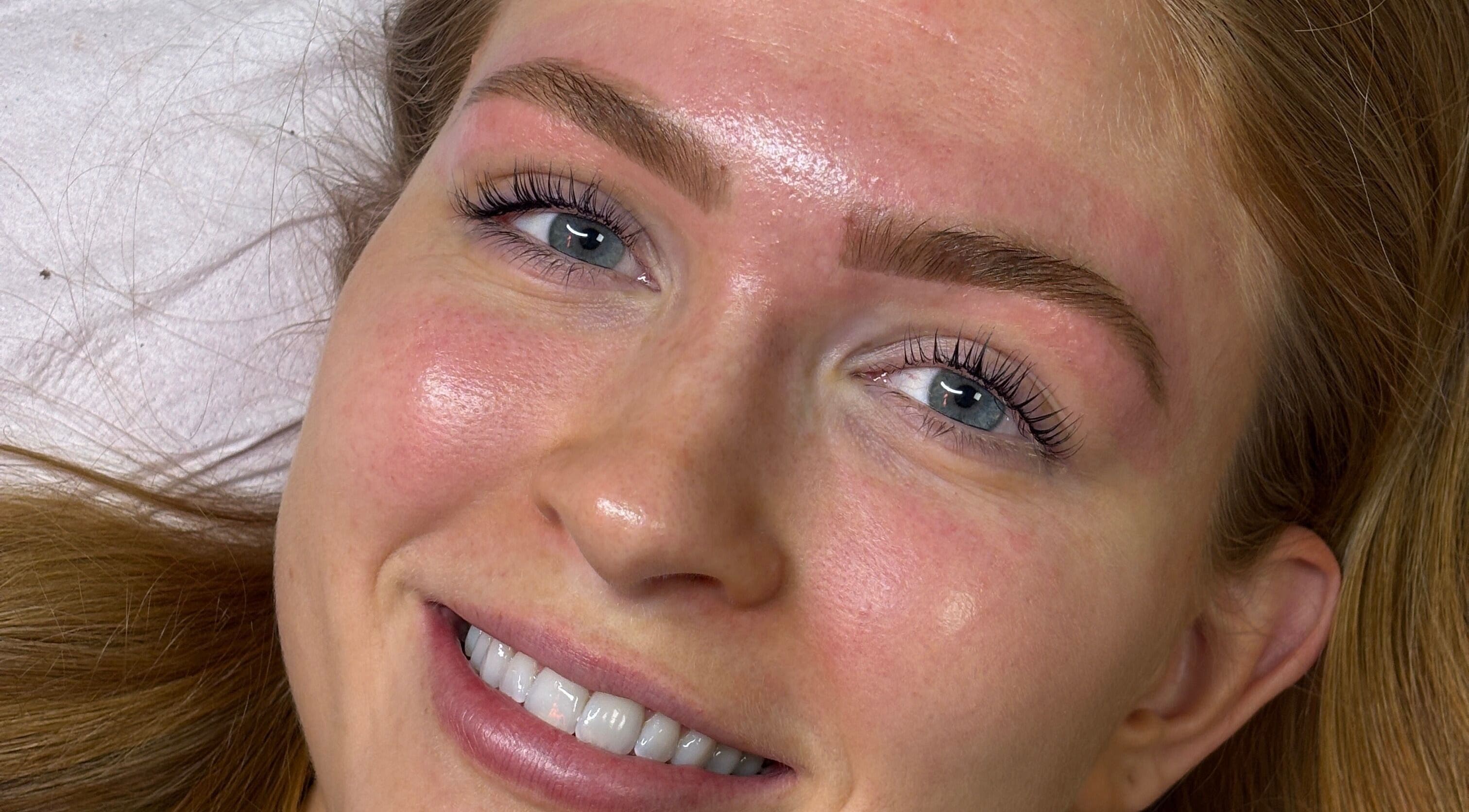 Smiling woman with fresh makeup at Face by Caitlyn in Ginger by Zoe, Cardiff, Wales, GB.