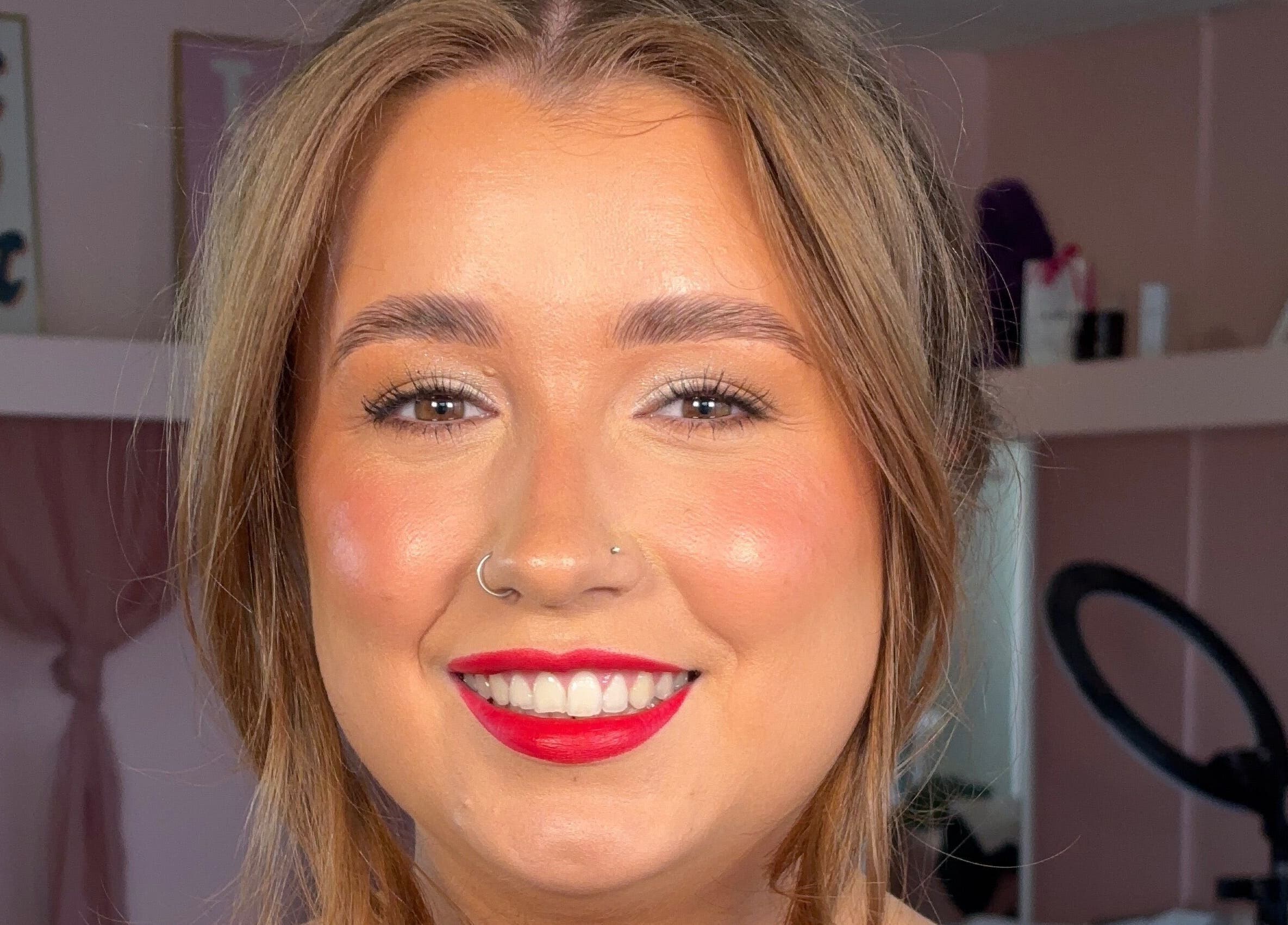 Beautiful woman with vibrant makeup at Face by Caitlyn in Ginger by Zoe, Cardiff, Wales, GB.