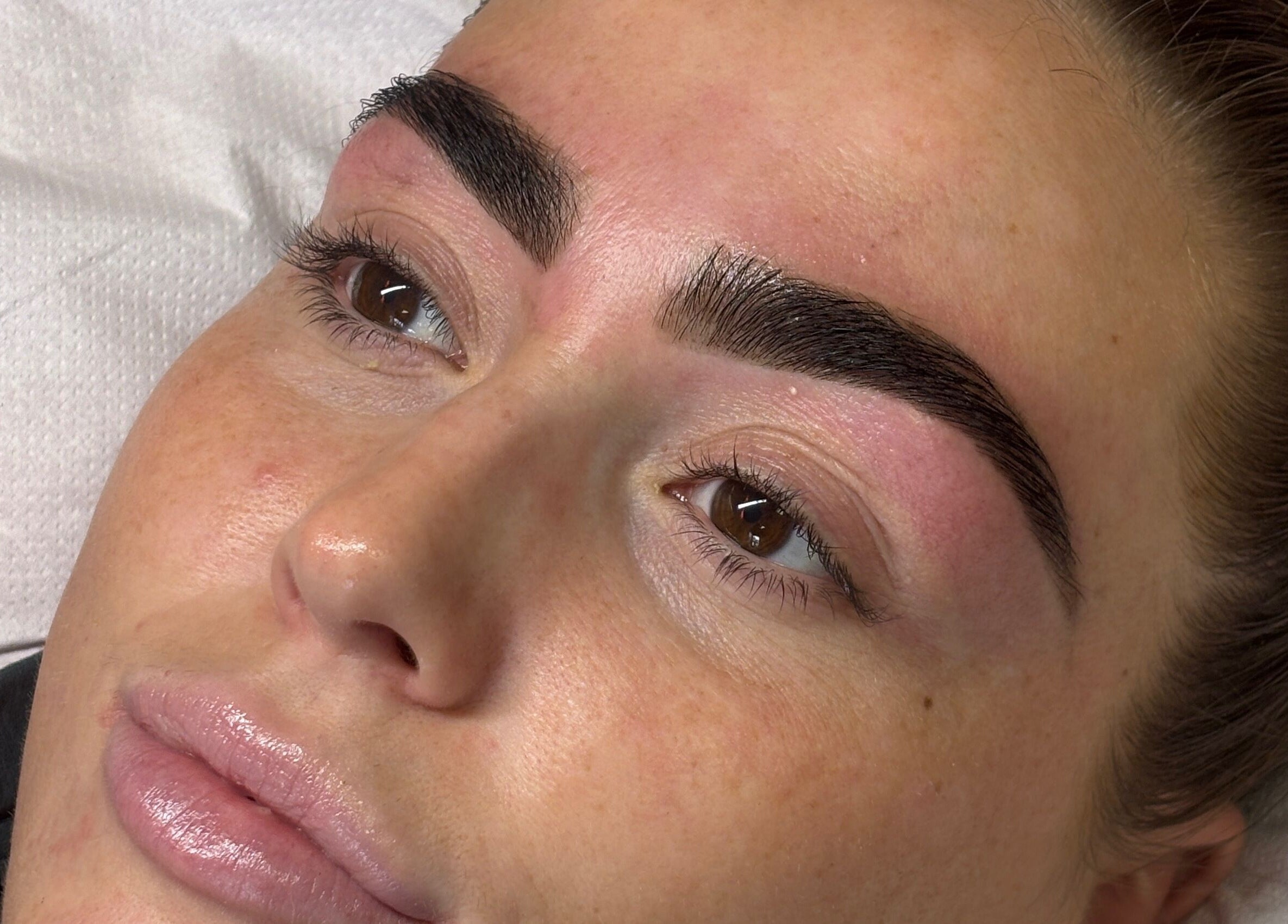 Close-up of meticulously shaped eyebrows at Face by Caitlyn in Ginger by Zoe, Cardiff, Wales, GB.