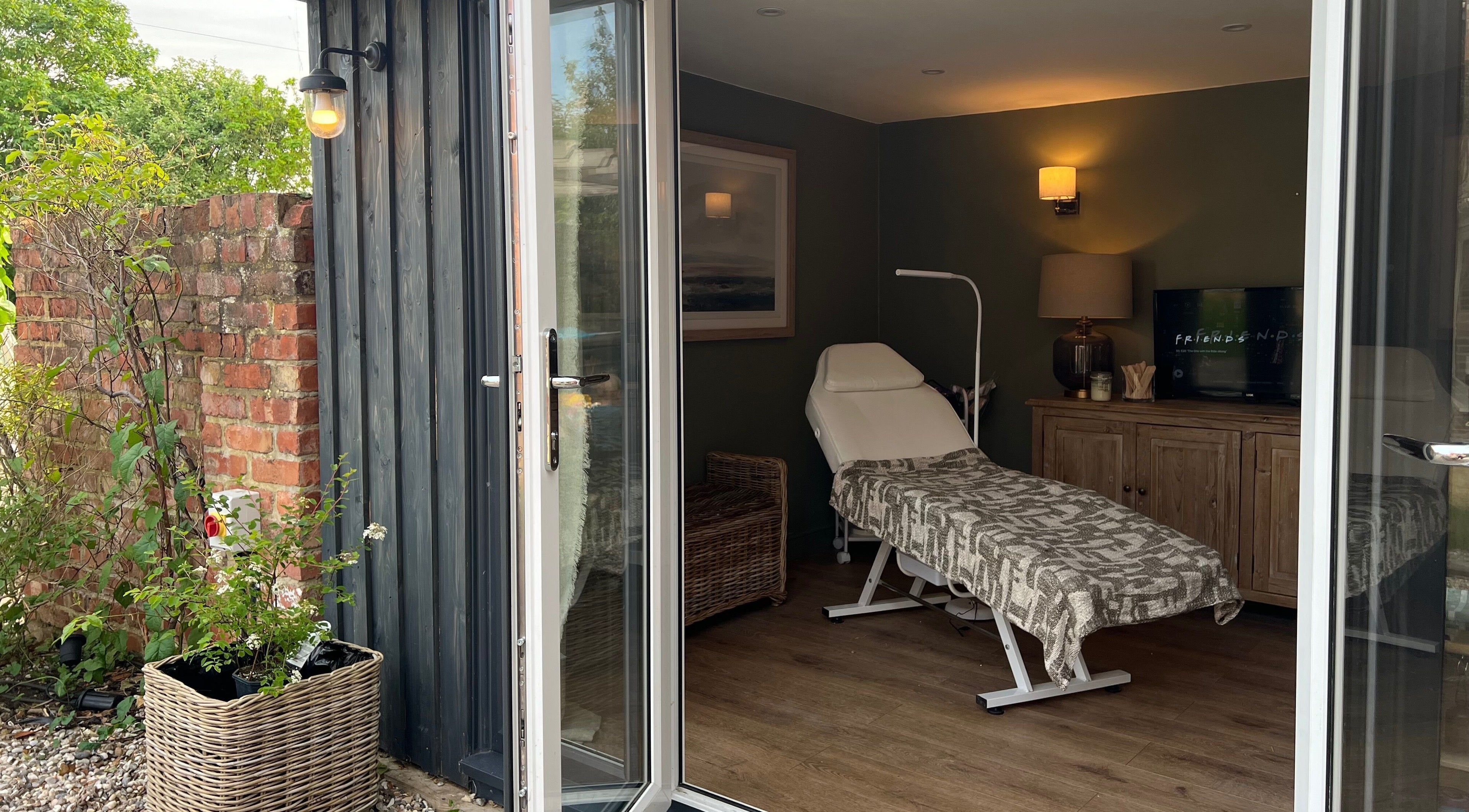 Cozy treatment room at The Wax Hut, Kinsham Tewkesbury, England, GB with a relaxing ambiance.