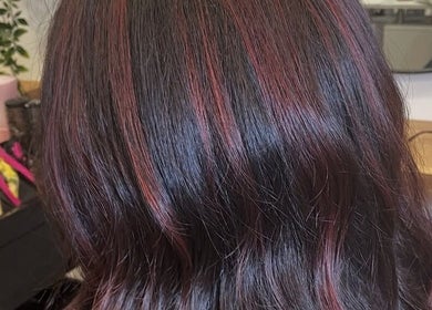 Beautifully styled hair at Hair by Abigail in Nairn, Scotland, GB showcasing rich, vibrant colors.