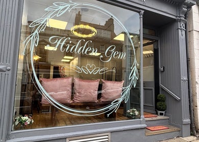 Stylish storefront of Hair by Caitlyn Watney in Berwick-upon-tweed, England, featuring elegant decor.