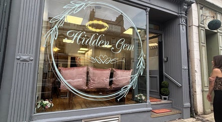 Stylish storefront of Hair by Caitlyn Watney in Berwick-upon-tweed, England, featuring elegant decor.