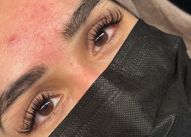 Close-up of elegant lash extensions at Lashgal.ldn, Ilford, GB, showcasing meticulous artistry.