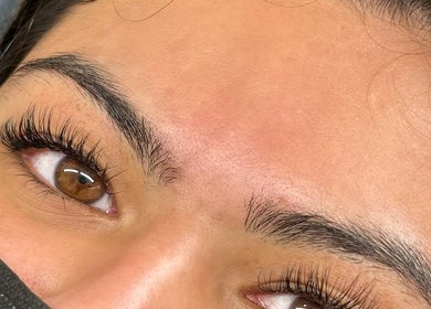 Close-up of perfectly styled lashes at Lashgal.ldn, Ilford, GB. Expert eyelash extensions enhancing natural beauty.