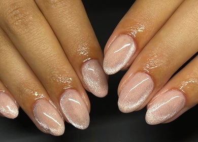 Shimmering pink nails at Clo Glo Studio, Cape Town, Western Cape, ZA, exemplifying elegant manicure style.