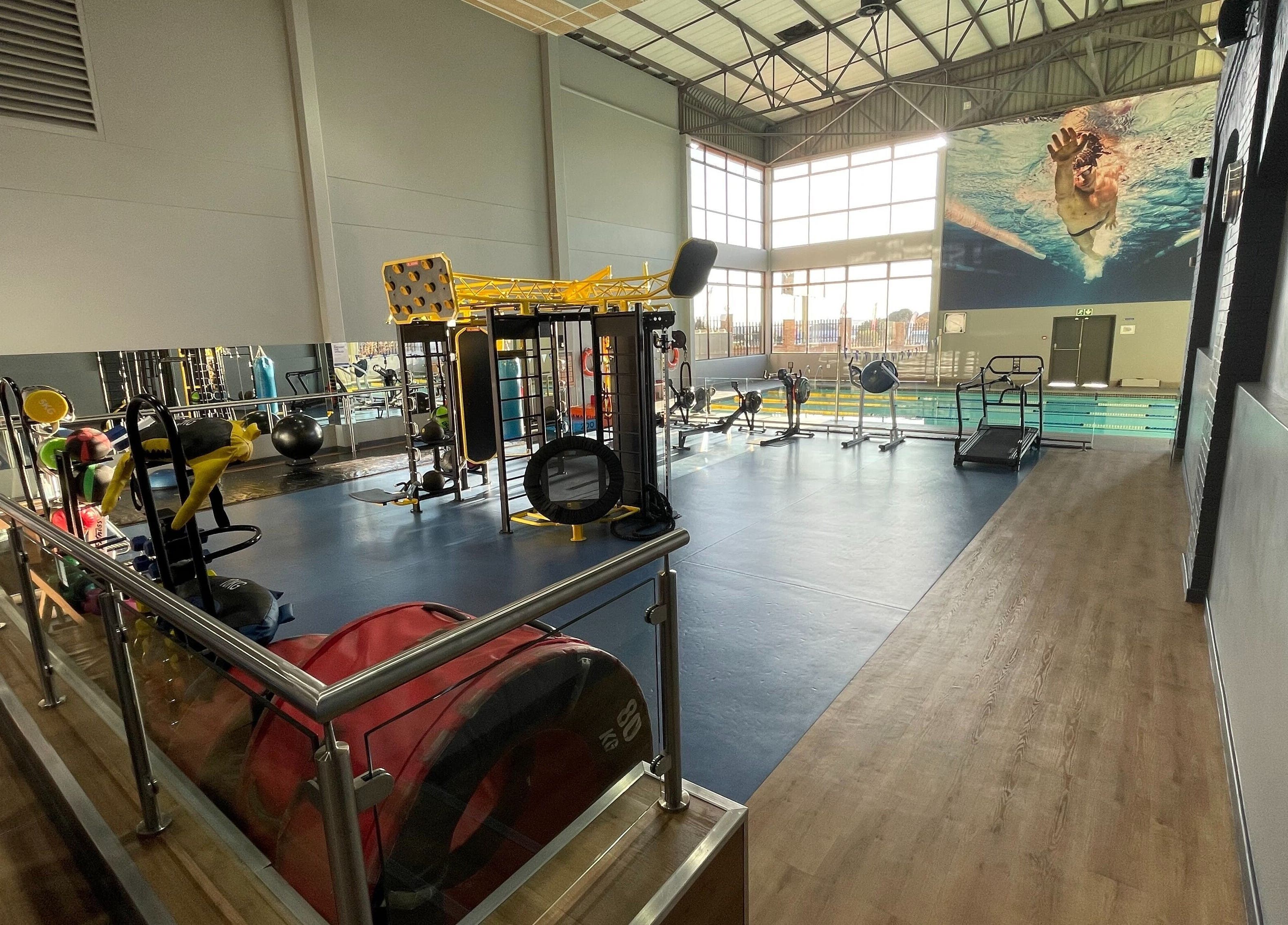State-of-the-art fitness area at Khyla Kotzé Biokineticist, Roodepoort, Gauteng, ZA with pool view.