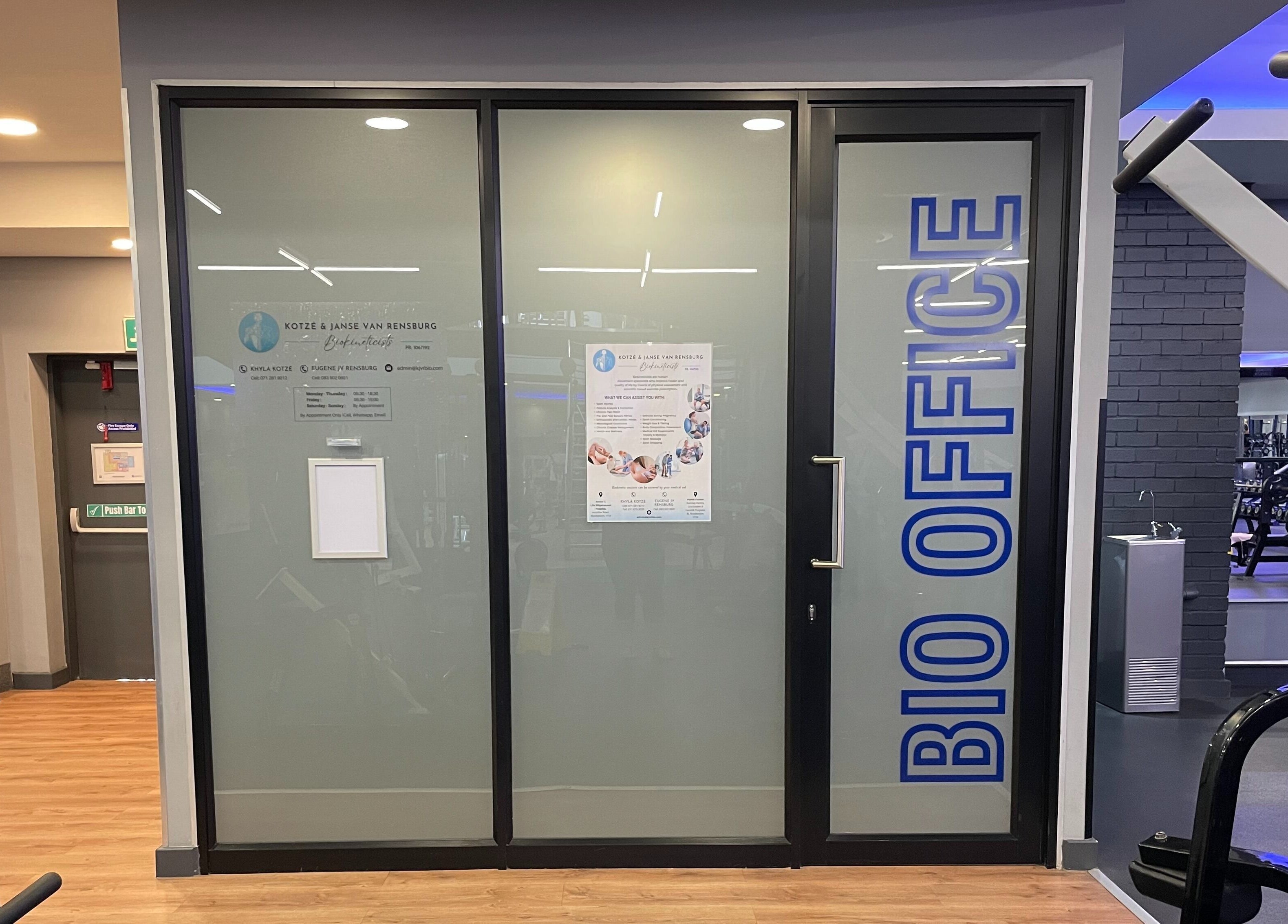 Entrance to Khyla Kotzé Biokineticist office in Roodepoort, Gauteng, ZA, featuring a modern glass design.