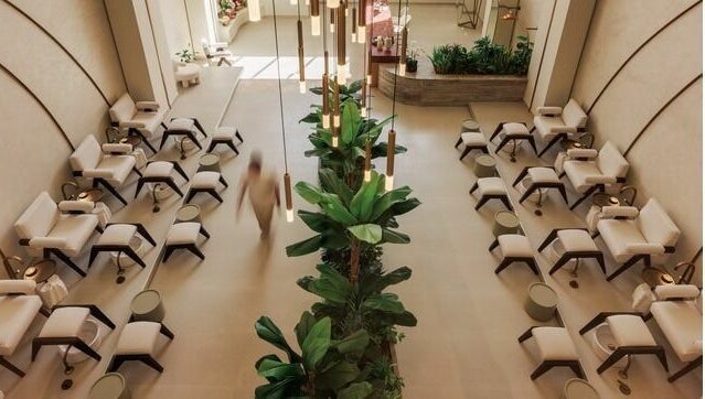 Elegant seating and greenery in Wthn Spa, Riyadh, Riyadh Province, SA, offering a tranquil ambiance.