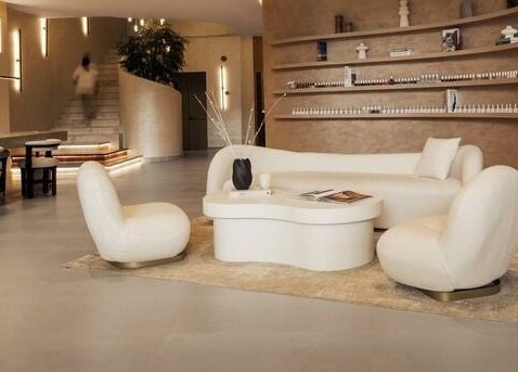 Elegant lounge area at Wthn Spa in Riyadh, Riyadh Province, SA, featuring modern seating and decor.