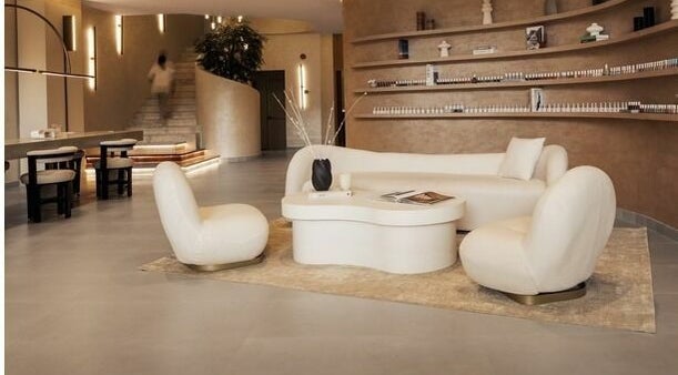 Elegant lounge area at Wthn Spa in Riyadh, Riyadh Province, SA, featuring modern seating and decor.