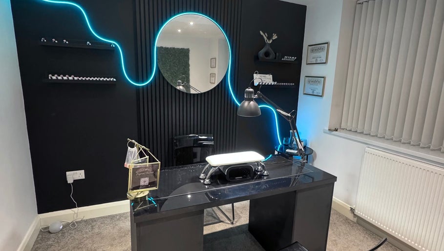 Stylish nail station at Gemini Beauty Lounge, Newthorpe, England, GB with ambient neon lighting.