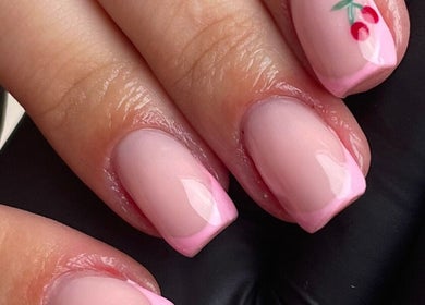 Elegant pink cherry nail art at Gemini Beauty Lounge, Newthorpe, England, GB.