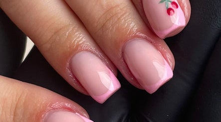 Elegant pink cherry nail art at Gemini Beauty Lounge, Newthorpe, England, GB.