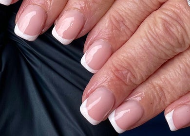 Freshly manicured French nails at Gemini Beauty Lounge, Newthorpe, England, GB.