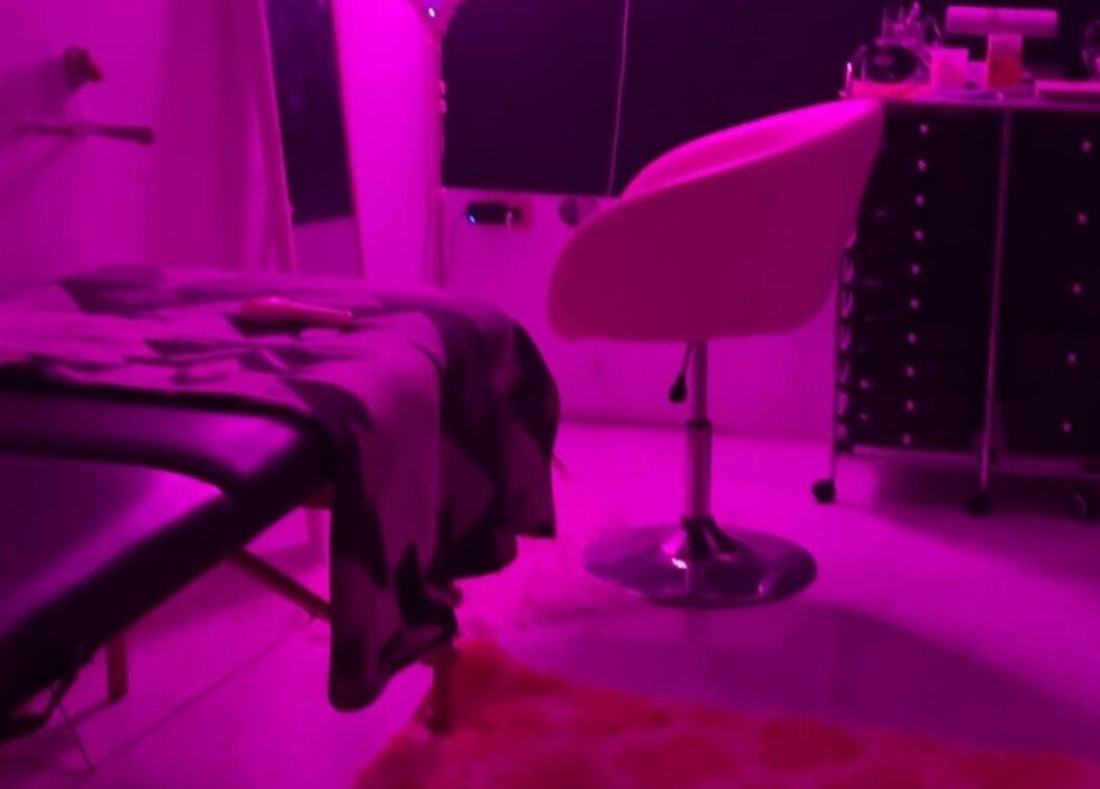 Relaxing beauty room at Kkouture.ja, Kingston, St. Andrew Parish, JM with pink lighting and modern decor.