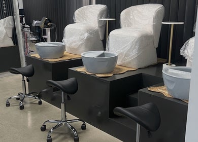 Modern pedicure chairs at AestheticsbyCliff SPA, Salt Lake City, Utah, US, offering a luxurious experience.