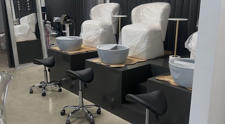 Modern pedicure chairs at AestheticsbyCliff SPA, Salt Lake City, Utah, US, offering a luxurious experience.