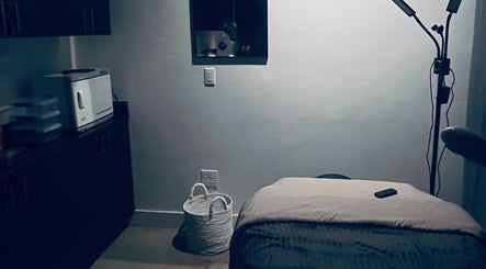 Cozy treatment room at AestheticsbyCliff SPA, Salt Lake City, Utah, US, offering a relaxing ambiance.