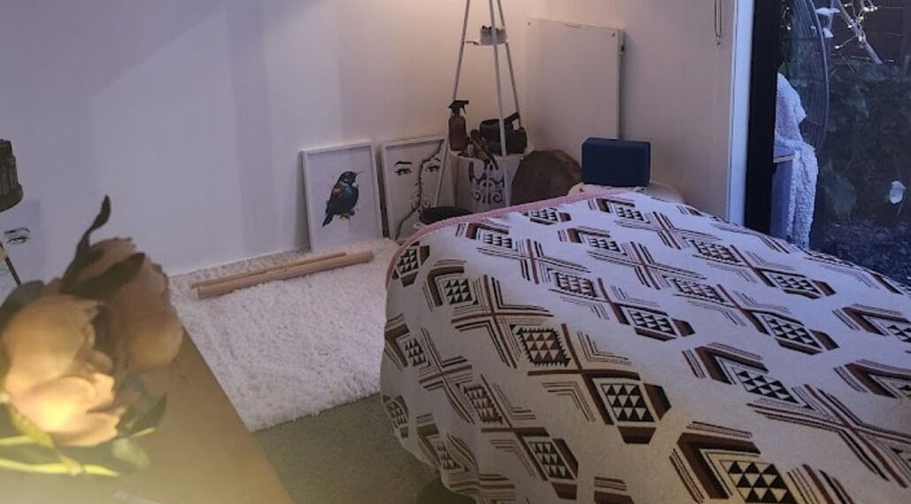 Tranquil wellness room at Kotiora, Ōtaki, Wellington, NZ with decorative artwork and calming decor.