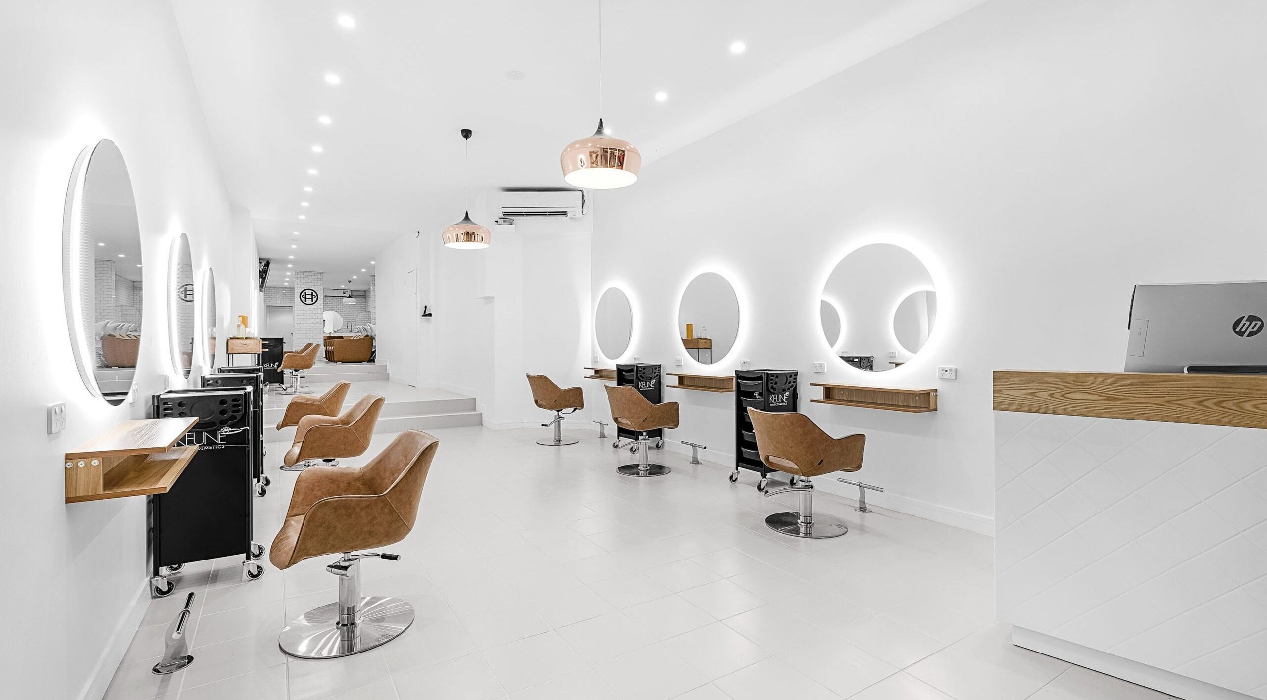 Modern interior of Head Office Hair Specialist in Bondi Junction, New South Wales, AU with sleek decor.