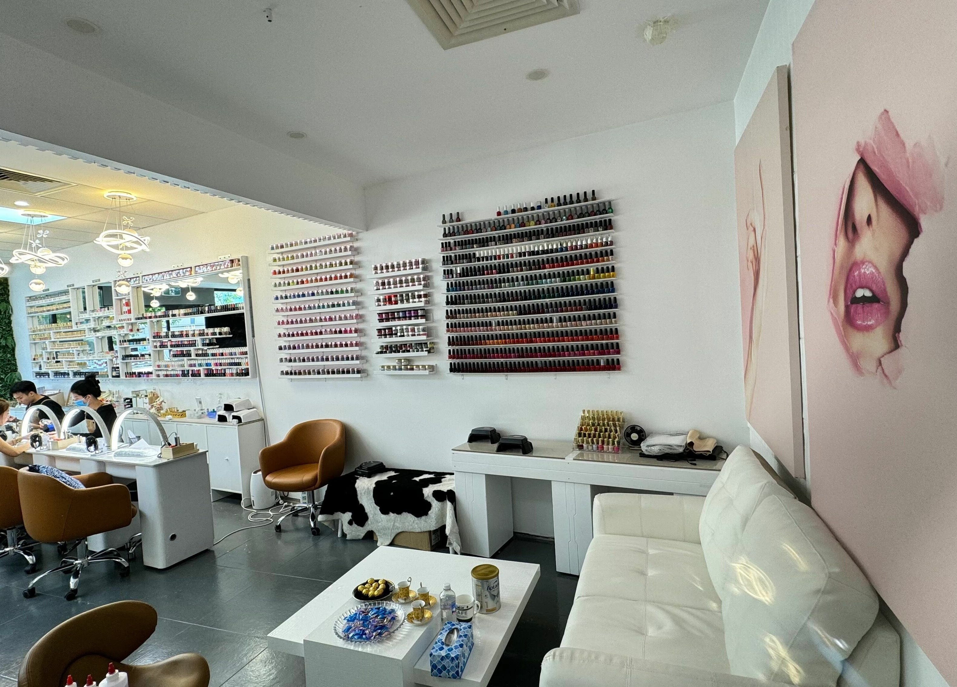 Interior of LYN Nails Studio in Southport, Queensland, AU with modern decor and nail polish displays.