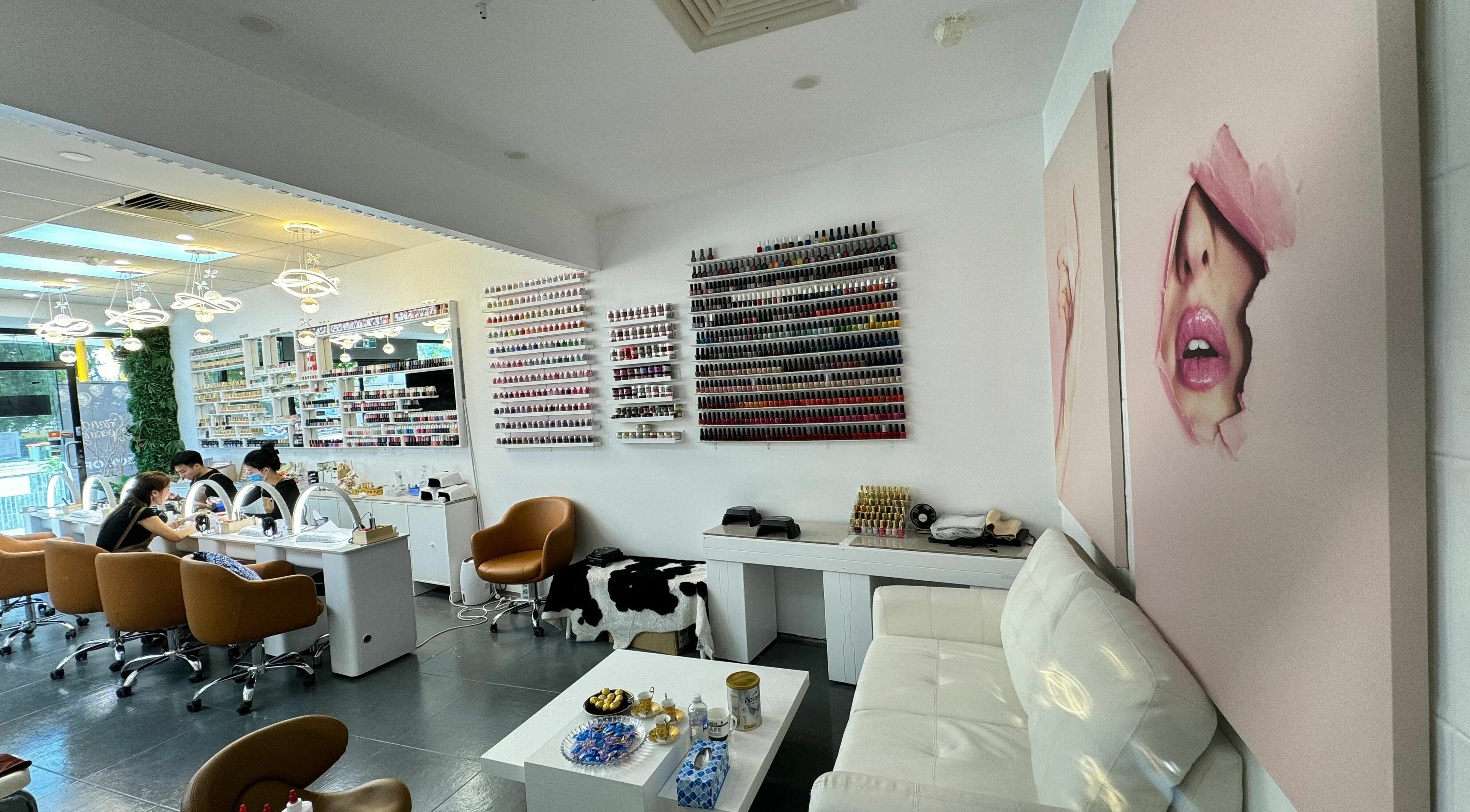Interior of LYN Nails Studio in Southport, Queensland, AU with modern decor and nail polish displays.