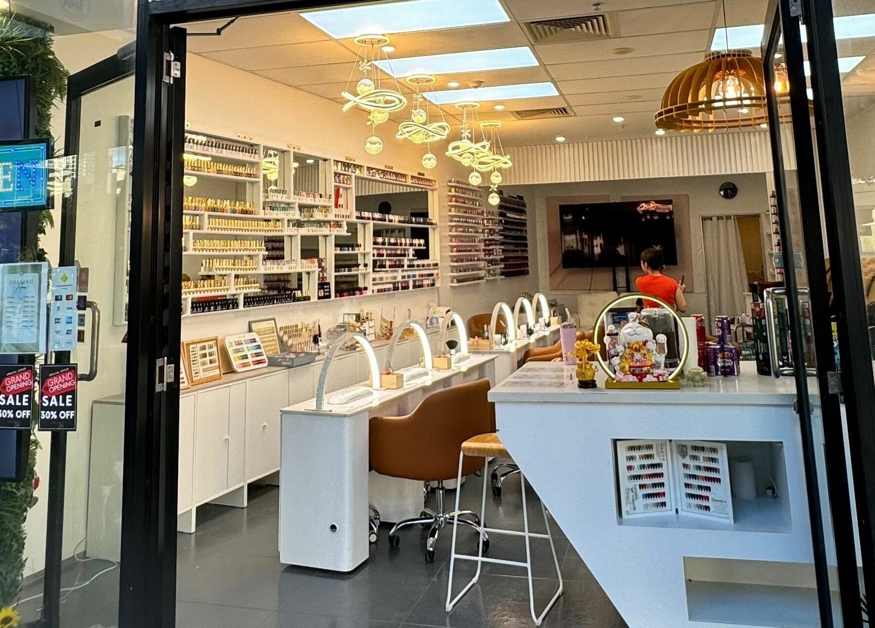 Interior of LYN Nails Studio, Southport, Queensland, AU showcasing nail stations and polish displays.