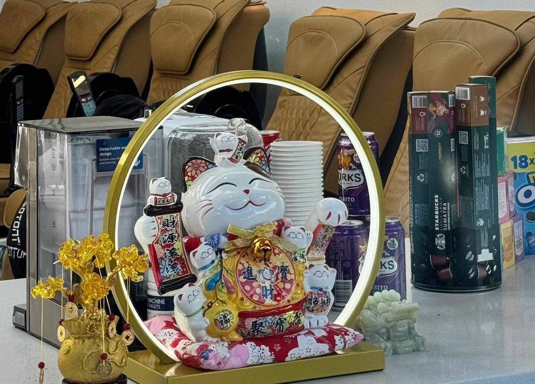 Inviting display with lucky cat figurine at LYN Nails Studio, Southport, Queensland, AU.