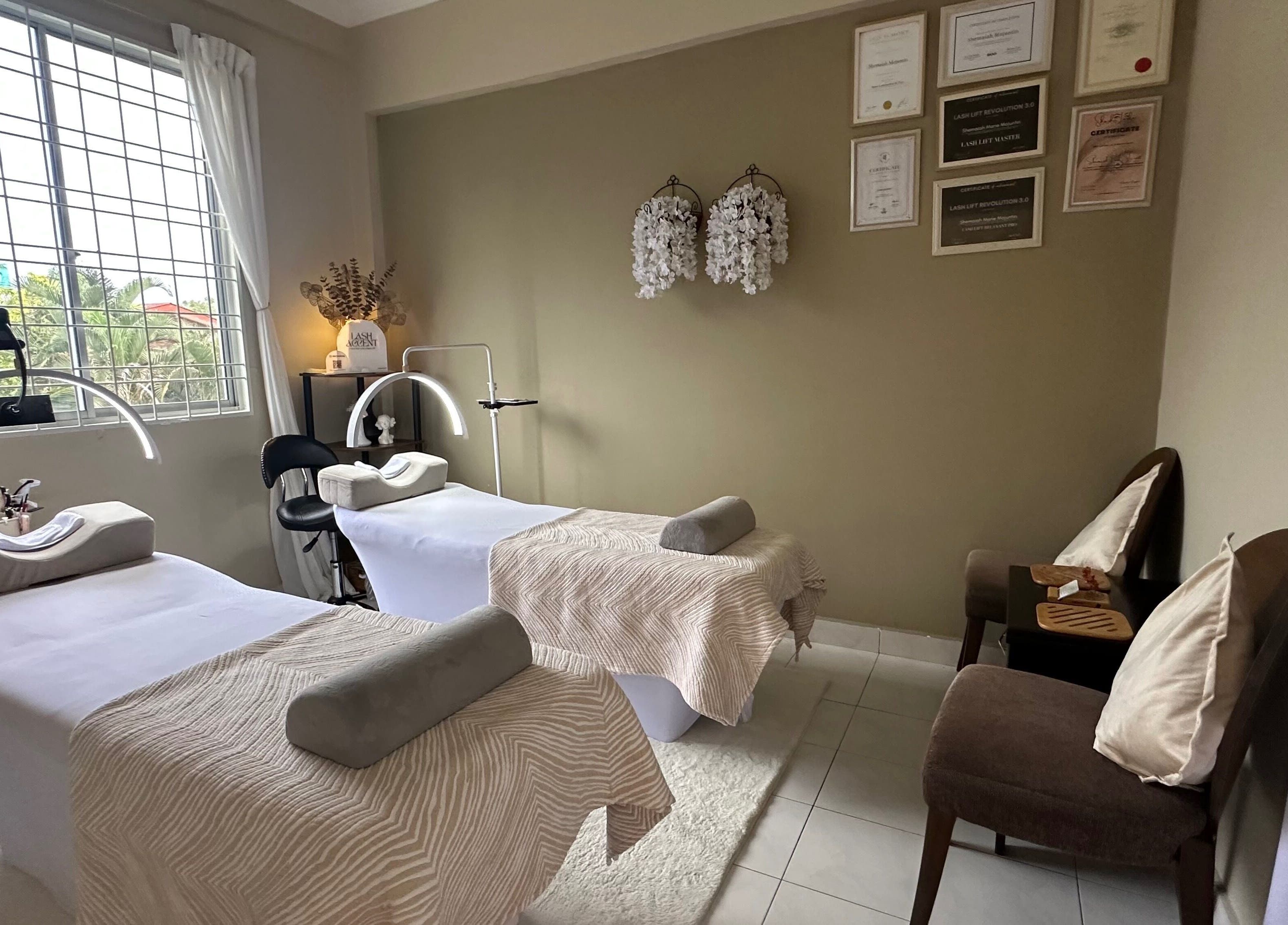 Serene massage room at Lash Accent, Kota Kinabalu, Sabah, MY with two treatment beds and elegant decor.