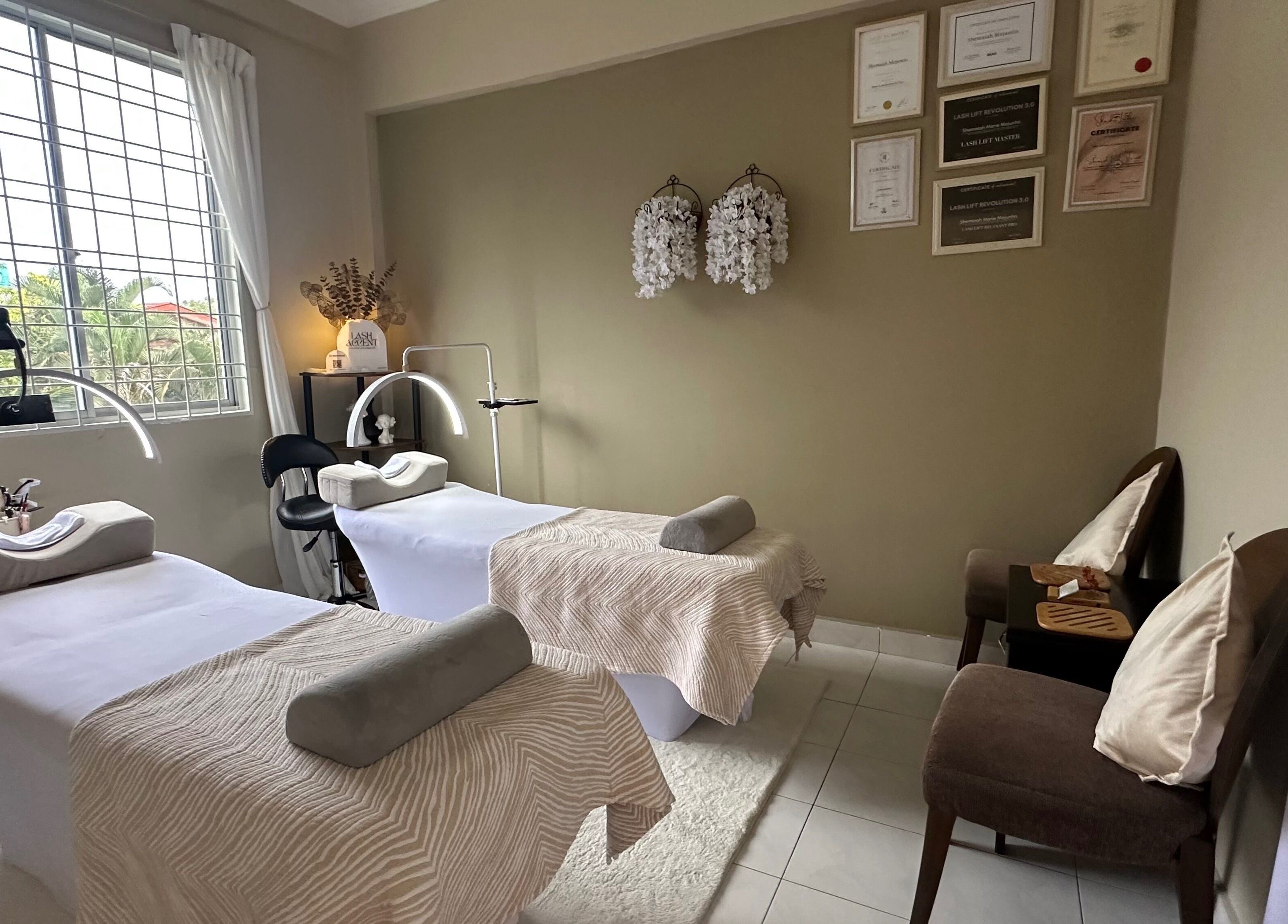 Serene massage room at Lash Accent, Kota Kinabalu, Sabah, MY with two treatment beds and elegant decor.