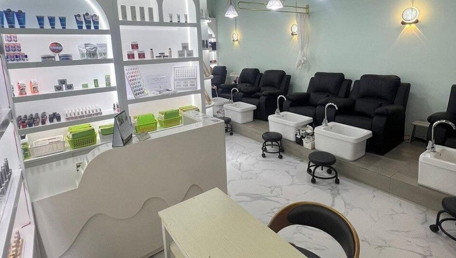 Ezen Nail, Eyelash & Beauty Salon at Woodlands/Admiralty, Singapore, SG. Stylish pedicure spa setup with products display.