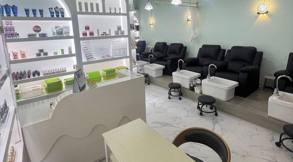 Ezen Nail, Eyelash & Beauty Salon at Woodlands/Admiralty, Singapore, SG. Stylish pedicure spa setup with products display.