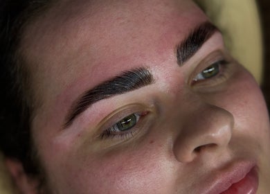Expert brow enhancement at Bronzed Beauty in Bangor, Northern Ireland, GB for stunning definition.